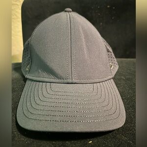 Navy Blue Melin A-Game 56cm (small) Hydro Cap - Gently Worn